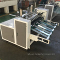 Automatic partition slotter machine for corrugated paperboard partitioner